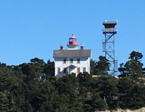 fun beach towns Yaquina Bay Lighthouse