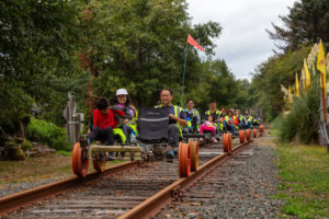 Pedal cars on the rail tracks 10 Reasons to Visit the Northern Oregon Coast will give you some amazing ideas for vacation locations to visit. Looking for the perfect beach getaway? The Oregon beach towns of Tillamook, Garibaldi, Rockaway, Wheeler, Seaside, Cannon Beach and Astoria are filled with fun family activities. Many of them are free. Learn about things to do on the northern coast of Oregon and plan your northern Oregon coast roadtrip using this as your guide! #northernoregoncoasttravel #familytraveltips #beachtrip