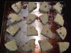 Easy White Chocolate Raspberry Scones on baking sheet