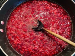 canned raspberry syrup recipe in skillet