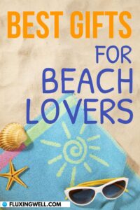 Best Gifts for Beach Lovers beach towel and sunglasses