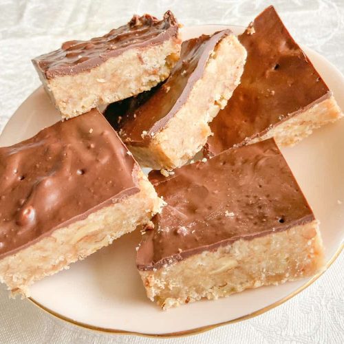 chocolate covered toffee shortbread on a china plate