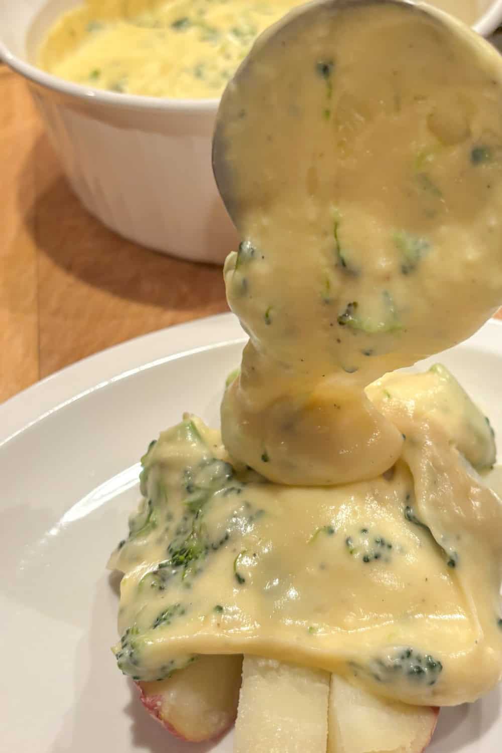 broccoli cheese sauce for baked potatoes pouring