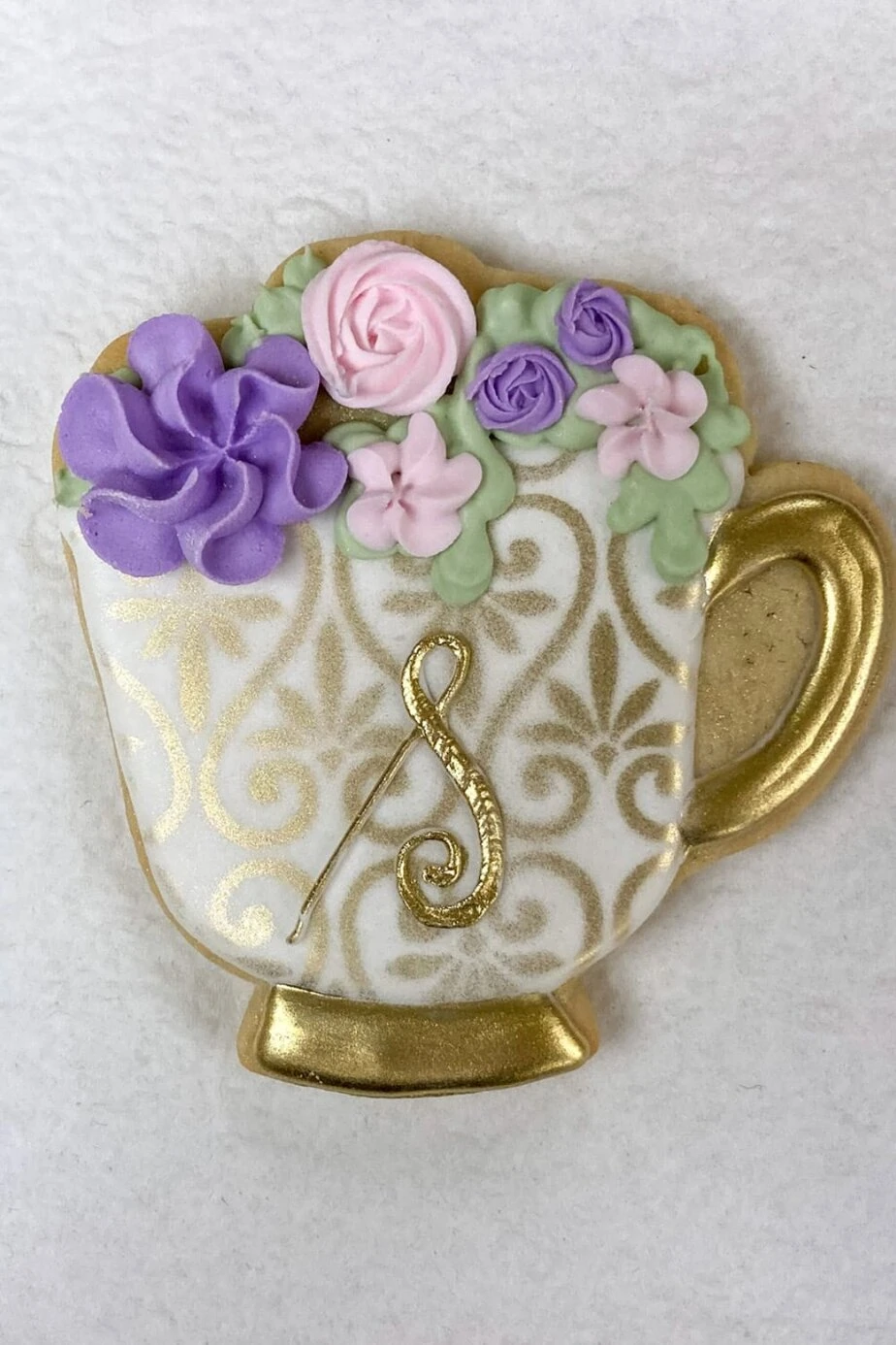 tea party birthday party ideas favor of a decorated cookie