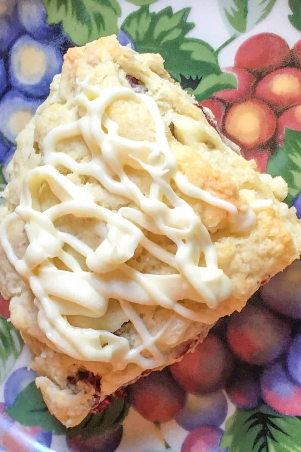 tea party scone with white chocolate drizzle